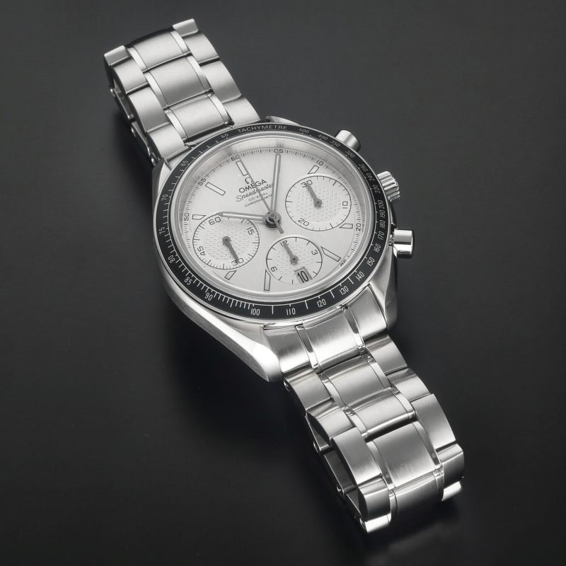 c. 2023 Omega Speedmaster Racing 326.30.40.50.02.001 – New, Full Set, Silver Dial with Teak Effect - Image 12